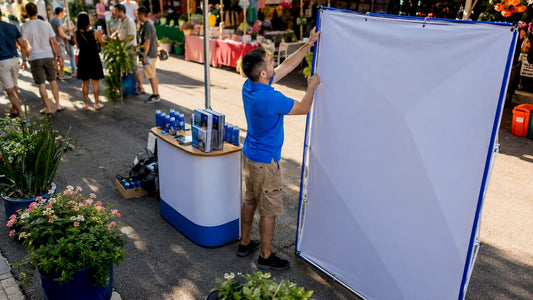 Event planner setting up exhibition backdrop