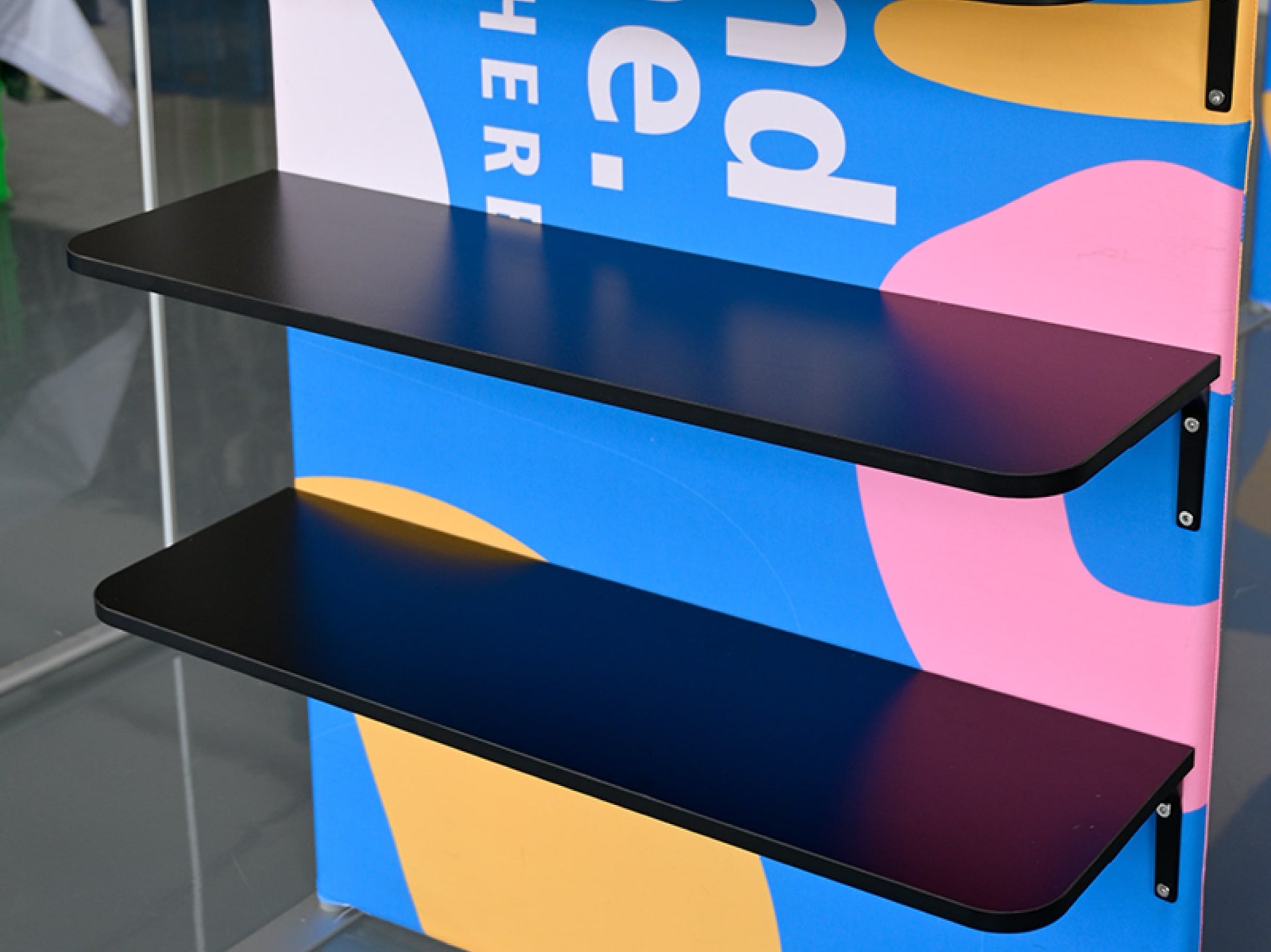 Square Arch Display with TV Rack - Racks closeup